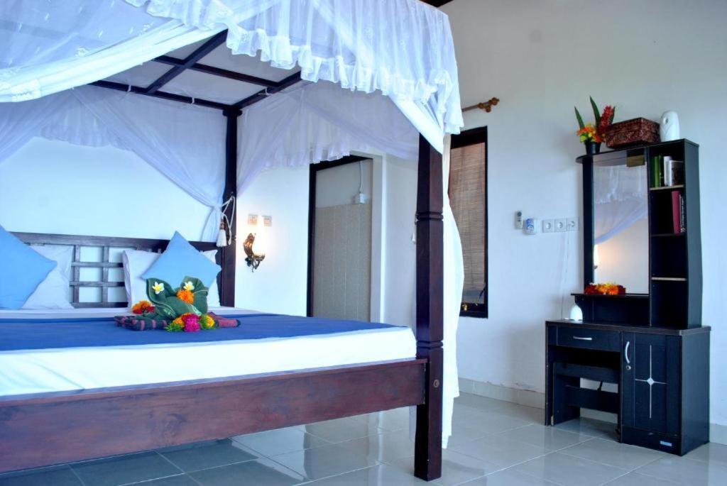 Titi Sedana Homestay آميدْ المظهر الخارجي الصورة