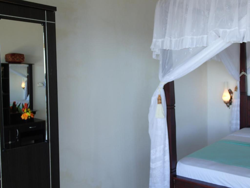 Titi Sedana Homestay آميدْ المظهر الخارجي الصورة
